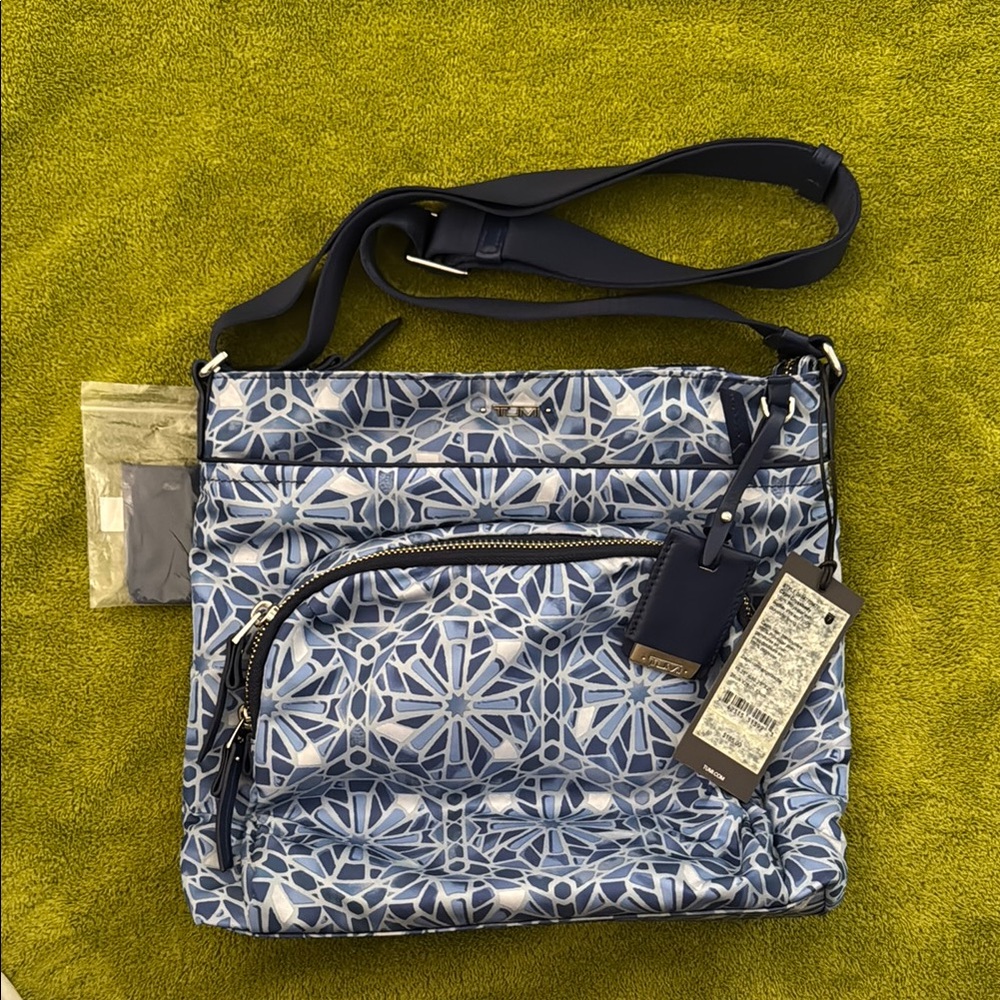 Tumi Blue Geometric Crossbody Bag